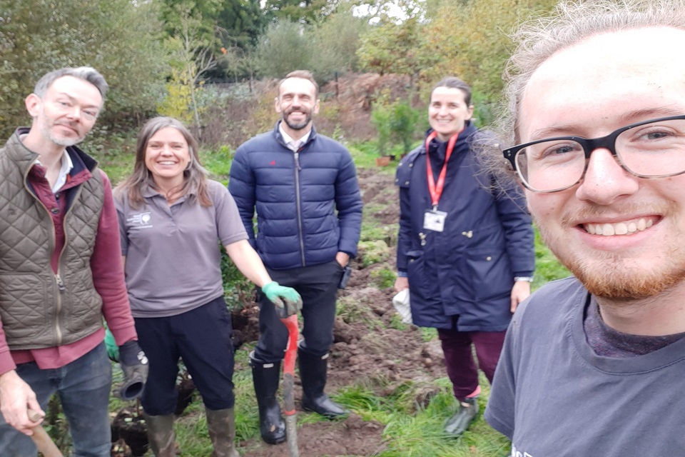 RHS staff who planted the hedges and centre Oliver Woolley from Hoe Valley School